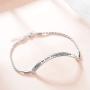 “She Believed She Could So She Did” Sterling Silver Engraved Inspirational Adjustable Bracelet Graduation Gift for Her, Women (White Gold Plated)