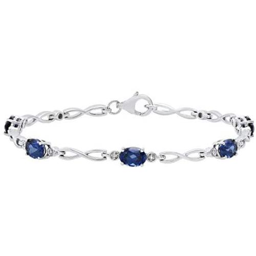 Dazzlingrock Collection 7X5 mm Oval Lab Created Blue Sapphire Ladies Tennis Bracelet with Diamond Accents, Sterling Silver