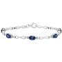 Dazzlingrock Collection 7X5 mm Oval Lab Created Blue Sapphire Ladies Tennis Bracelet with Diamond Accents, Sterling Silver