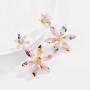 Nicole Miller New York Two Flowers Different Sizes Off-white Acrylic Transparent GoldDangle Earrings