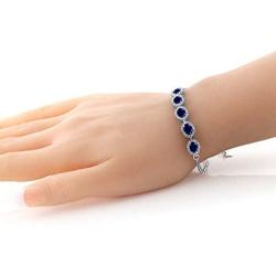 Gem Stone King 925 Sterling Silver Blue Sapphire Gemstone Birthstone Bracelet, 6.14 Ctw, Center Stones: 7X5MM, 7 Inch + 1.5 inch Extender