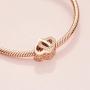 Pandora Jewelry Entwined Hearts Cubic Zirconia Charm in Pandora Rose