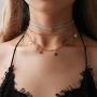 Kakaco Boho Star Pendant Necklaces Layered Sun Choker Necklace Beaded Gold Chain Jewelry for Women and Girls