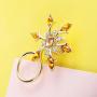 PANGRUI Exquisite Winter Holiday Snowflake Flower with Rhinestones Magnetic Eyeglass Holder Brooch Pin