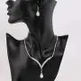 Yikisdy Bride Wedding Necklace Earrings Set Silver Crystal Jewelry Sets Bridal Neck Chain Jewelry Rhinestone Pendant Necklace Accessories Gifts for Women and Girls (Set of 3, 1 necklace and 2 earrings) Yikisdy Bride Wedding Necklace Earrings Set Silver Crystal Jewelry Sets Bridal Neck Chain Jewelry Rhinestone Pendant Necklace Accessories Gifts for Women and Girls (Set of 3, 1 necklace and 2 earrings)