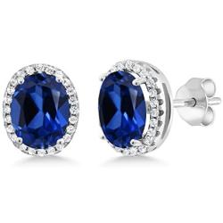 Gem Stone King 925 Sterling Silver Blue Simulated Sapphire Halo Earrings For Women (5.08 Ct Oval 9X7MM)