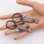 FUSTMW Pregnancy Announcement Gifts Daddy and Mommy Est 2021 Keychain Set New Parents Gift First Time Mom Gifts Baby Footprint Charm Daddy to Be Gifts