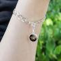 GRAPHICS & MORE Wonder Woman Movie Golden Lasso Logo Antiqued Bracelet Pendant Zipper Pull Charm with Lobster Clasp