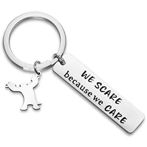 WUSUANED We Scare Because We Care Keychain with Monster Charm Movie Lover Jewelry Gift for Movie Fan Best Friend