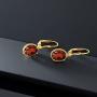 Gem Stone King 18K Yellow Gold Plated Silver Red Garnet Dangle Earrings For Women (7MM Length, 3.60 Ct Oval)