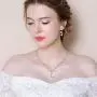 EleQueen Womens Cubic Zirconia Simulated Pearl Flower Filigree Bridal Necklace Earrings Jewelry Set Ivory Color EleQueen Womens Cubic Zirconia Simulated Pearl Flower Filigree Bridal Necklace Earrings Jewelry Set Ivory Color