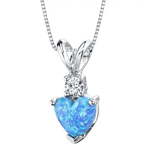 14 Karat White Gold Heart Shape Created Blue Opal Diamond Pendant 14 Karat White Gold Heart Shape Created Blue Opal Diamond Pendant