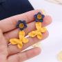 DAMLENG Unique Chic Handmade Bohemian Yellow Matte Flower Butterfly Dangle Drop Stud Earrings for Women Girls Statement Jewelry Gifts