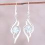 NOVICA Blue Topaz .925 Sterling Silver Dangle Earrings, Dazzling Gleam