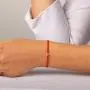 Karma and Luck - Sacred Sounds Red String OM Charm Bracelet