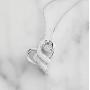 Dancing Diamond''Love Wrapped'' Heart Pendant Necklace in 925 Sterling Silver by Parade of Jewels (1/6 ct.tw.), 18''
