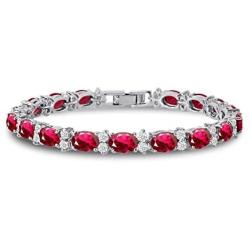 KEZEF CZ Tennis Bracelet - Oval 7x5 CZ & Round 2.50mm White CZ - Silver Over Brass - 7 Inch