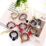 YADOCA 8 Pcs Bohemian Wood Beaded Bracelets Set for Women Boho Multilayer Tassel Strand Elephant Charm Bracelets Stretch