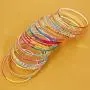 Touchstone New Gorgeous Rainbow Bangle Collection. Indian Bollywood Colorful Bangle Bracelets. Set of 24. in Antique Gold Tone for Women.