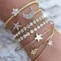 Zehory Boho Crystal Stackable Bracelets Gold Star Moon Open Cuff Bangle Bracelet Set Heart Stacking Bangle Charm Bracelet Jewelry for Women and Girls (4Pcs) Zehory Boho Crystal Stackable Bracelets Gold Star Moon Open Cuff Bangle Bracelet Set Heart Stacking Bangle Charm Bracelet Jewelry for Women and Girls (4Pcs)
