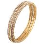 Touchstone ''Golden Bangle Collection Traditional Slim Single Line Clear Rhinestone Indian Bollywood Designer Jewelry Metal Bangle Bracelets in Antique Gold Tone for Women. Set of 4.