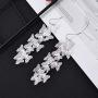 Nicole Miller New York Silvertone Casted Cutout Layered Butterfly Fashion Dangle Earrings