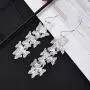 Nicole Miller New York Silvertone Casted Cutout Layered Butterfly Fashion Dangle Earrings Nicole Miller New York Silvertone Casted Cutout Layered Butterfly Fashion Dangle Earrings