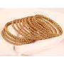 Touchstone ''Golden Bangle Collection Yellow Rhinestone Traditional Single Line Stunning Indian Bollywood Designer Jewelry Metal Bangle Bracelets in Antique Gold Tone for Women. Set of 12.