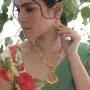 Tarinika Arina Gold-Plated Indian Jewelry Set with Necklace and Earrings - White Red Green Tarinika Arina Gold-Plated Indian Jewelry Set with Necklace and Earrings - White Red Green