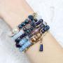 RIAH FASHION Bead Multi Layer Versatile Statement Bracelets - Stackable Beaded Strand Stretch Bangles Sparkly Crystal Mix, Tassel Charm