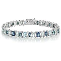 Ice Gems Sterling Silver Tanzanite, Blue and White Topaz Oval Tennis Bracelet