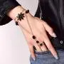 Chicque Boho Hand Chain Gold Rhinestone Finger Ring Black Flower Hand Bracelet Hand Jewelry for Women and Girls Chicque Boho Hand Chain Gold Rhinestone Finger Ring Black Flower Hand Bracelet Hand Jewelry for Women and Girls