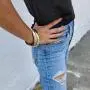 Caratina 14k Gold Plated, black Rhodium plated and rhodium plated triple omega ring intertwined fashion joy stackable trinity bracelet for women Caratina 14k Gold Plated, black Rhodium plated and rhodium plated triple omega ring intertwined fashion joy stackable trinity bracelet for women