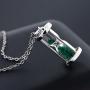 Gem Stone King 925 Sterling Silver Hourglass Pendant Necklace For Women with 0.75 Ct Emerald Dust and 18 Inch Silver Chain