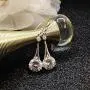 SBLING Platinum-Plated Silver Cubic Zirconia Tear Drop Earrings (6.5 cttw) SBLING Platinum-Plated Silver Cubic Zirconia Tear Drop Earrings (6.5 cttw)