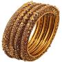 Touchstone ''Golden Bangle Collection Ethnic Style Filigree Work Yellow Citrine Rhinestone Indian Bollywood Designer Jewelry Metal Bangle Bracelets in Antique Gold Tone for Women. Set of 4.